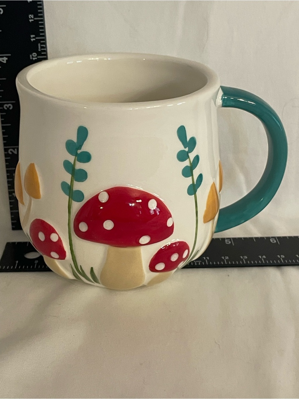 Red Mushroom Ceramic Mug with Teal Handle